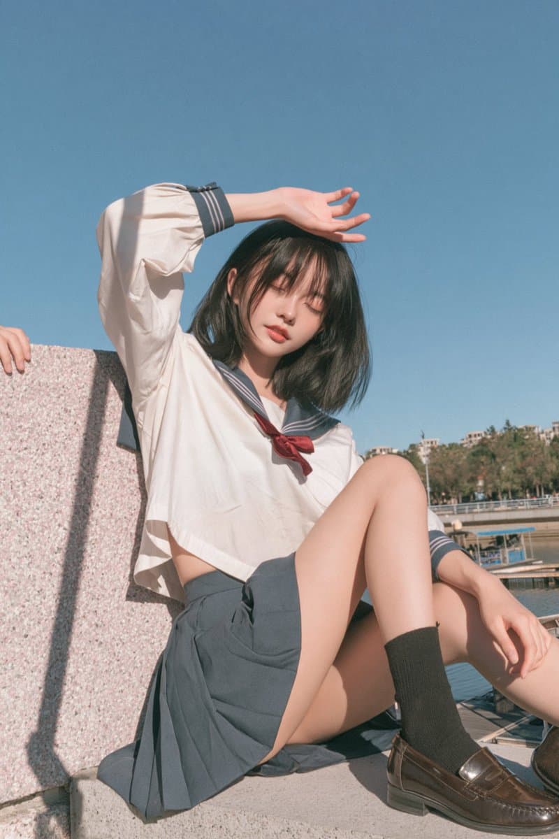Sunny Japanese Campus Portrait in a Sailor Uniform